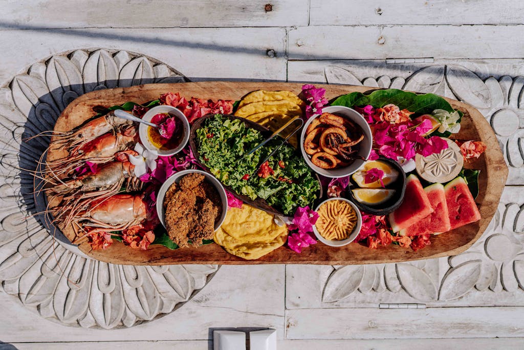 Authentic Zanzibar seafood platter with fresh tropical fruits and local delicacies.